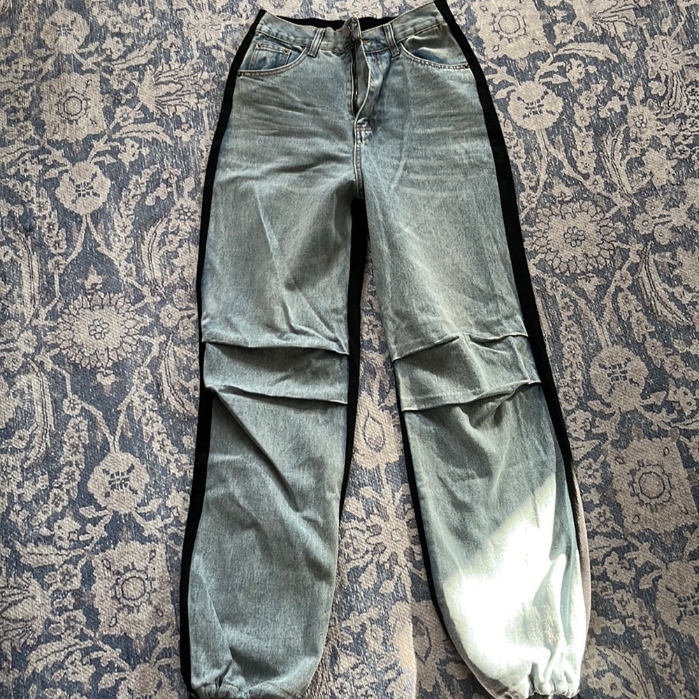 Shein size small jeans blue in the front black in the back.